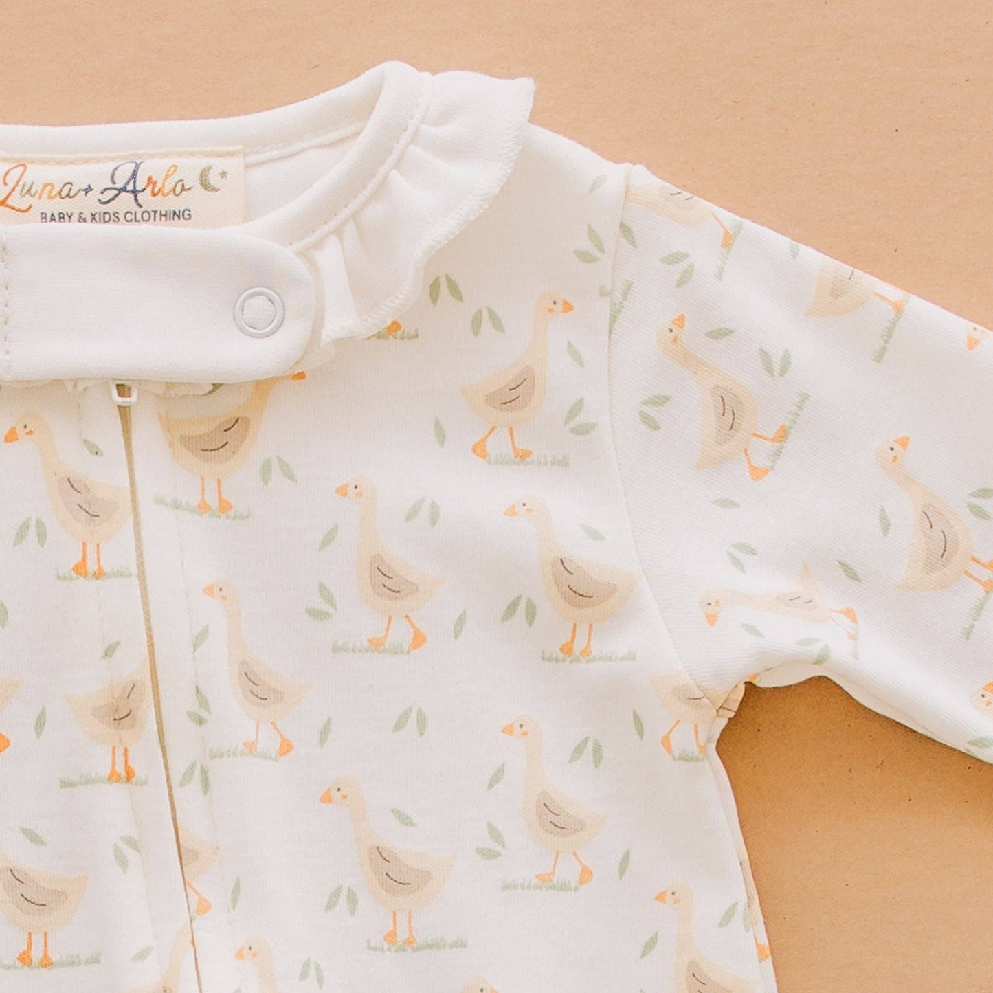 Goose Tales Ruffle Zip Footie