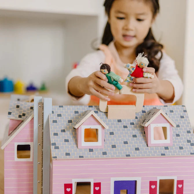 Melissa & doug fold hot sale and go dollhouse