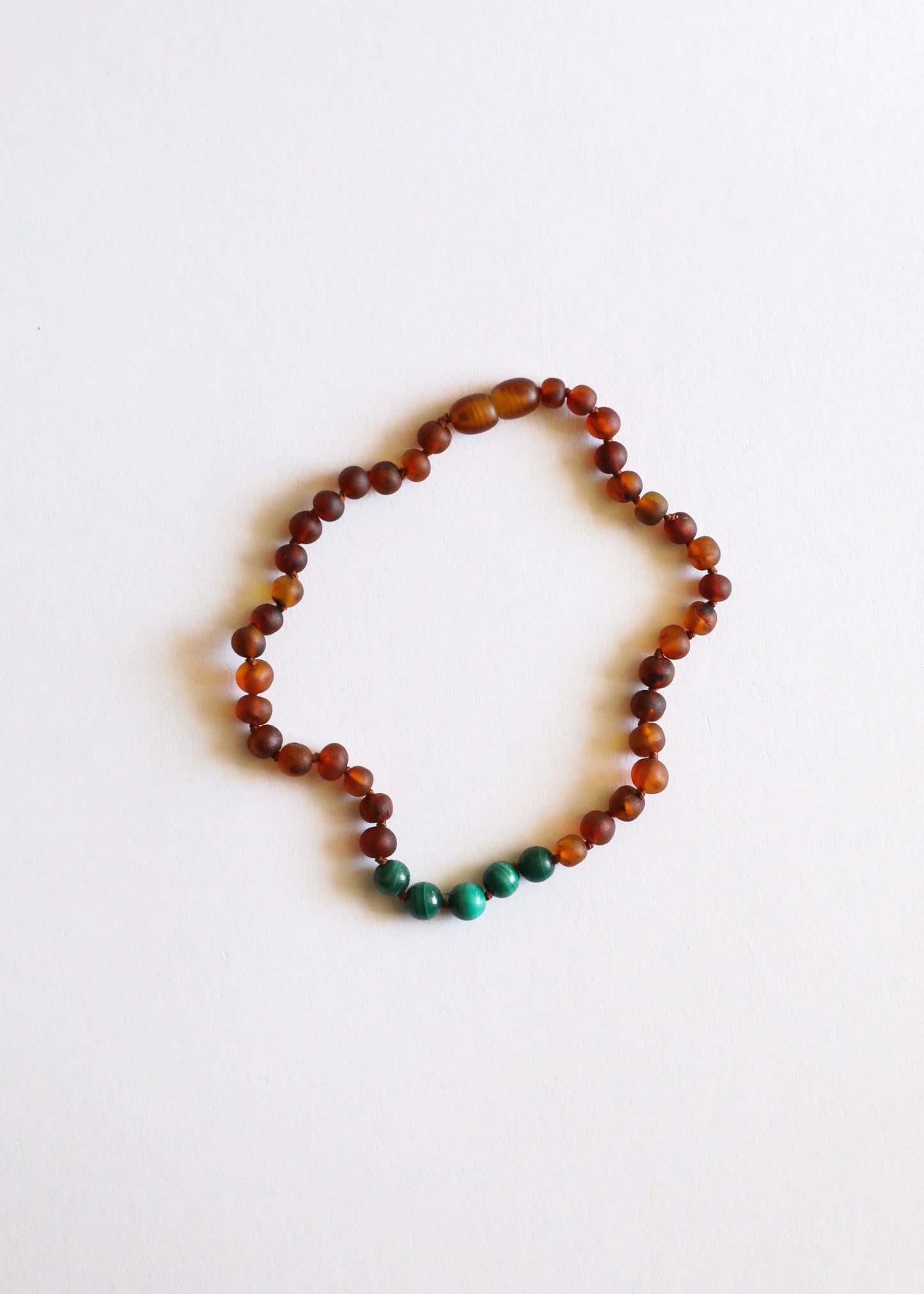 Raw Cognac Amber + Malachite